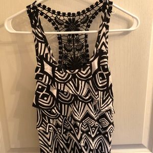Black and white ruffle front tank with lace back